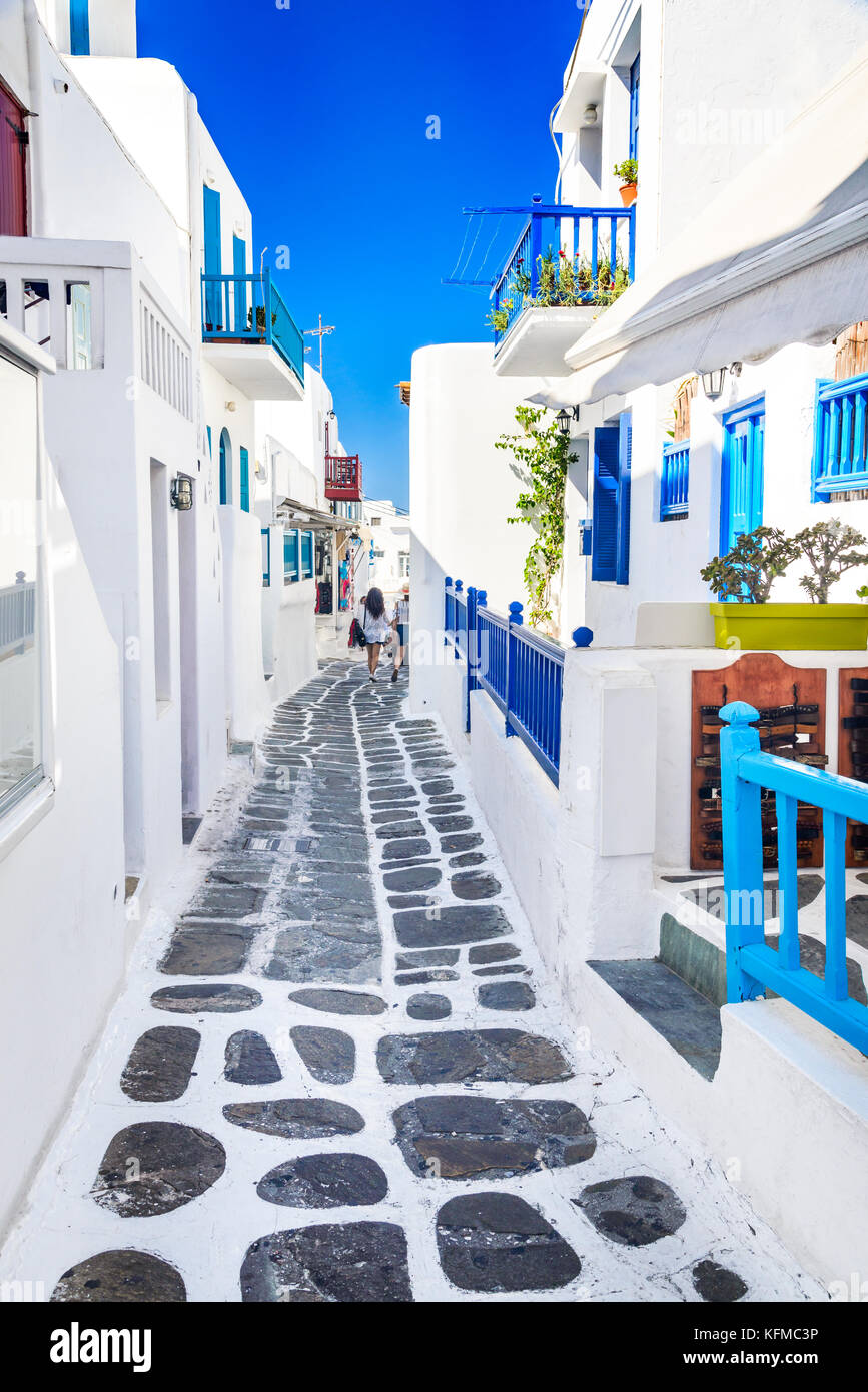 Mykonos, Greece. Whitewashed dotted alley in old city, Cyclades Greek Islands. Stock Photo
