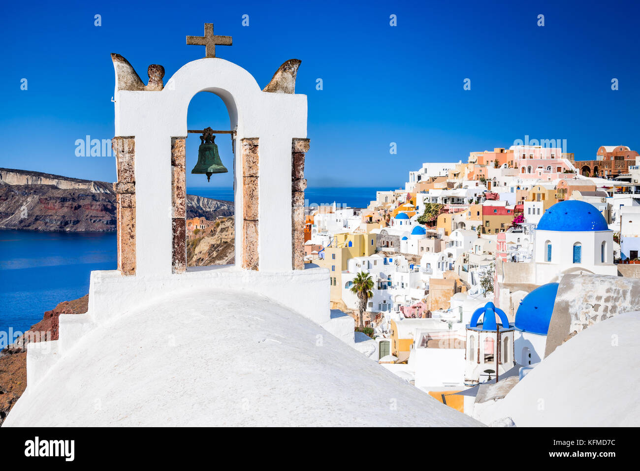 Oia, Santorini - Greece. Famous attraction of white village with cobbled streets, Greek Cyclades Islands, Aegean Sea. Stock Photo