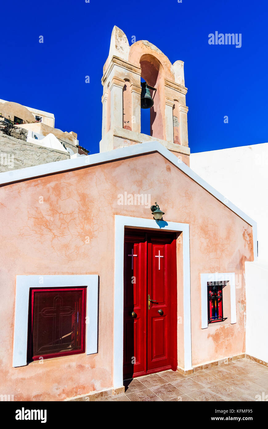 Santorini, Greece. Small colored church detail in Oia city in Thira, Greek Islands in Aegean Sea, greek landmark. Stock Photo