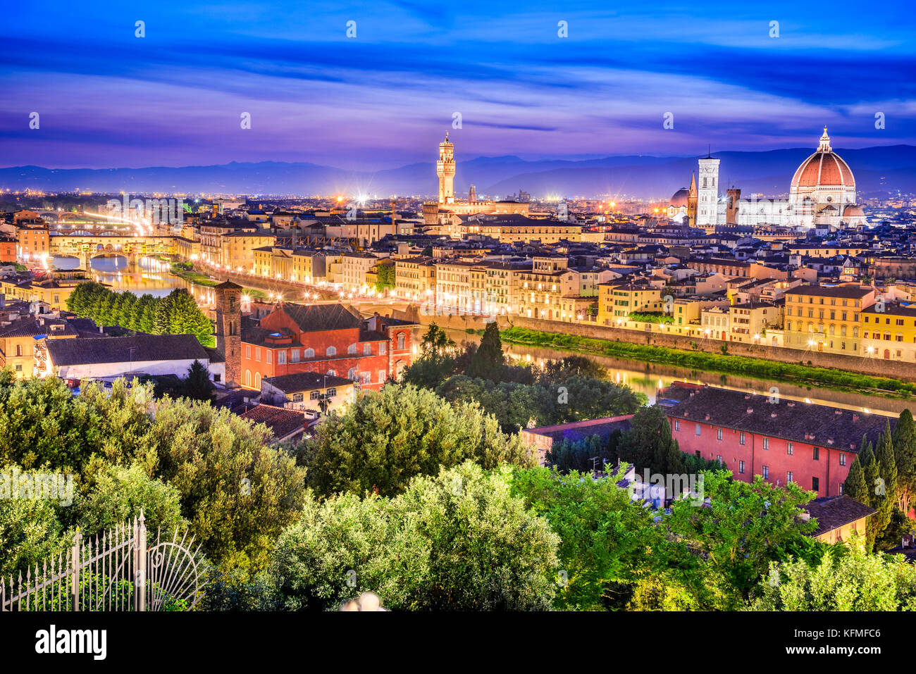 Florence, Tuscany - Night scenery with Duomo Santa Maria del Fiori and Palazzo Vecchio, Renaissance architecture in Italy. Stock Photo