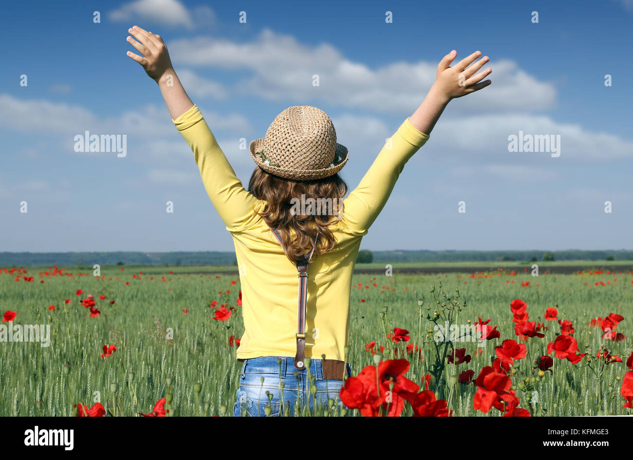 little girl in the meadow spring season Stock Photo - Alamy