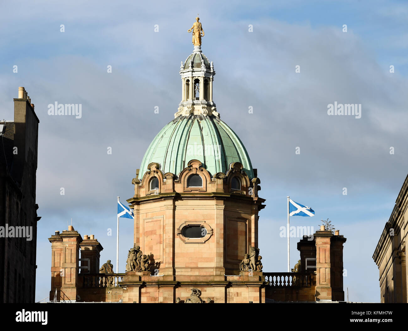 Flags fly from the top of the Bank of Scotland headquarters on the Mound, Edinburgh. Stock Photo