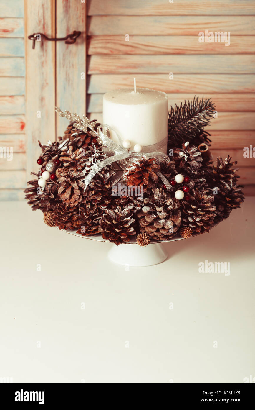 Christmas cones candlestick Stock Photo - Alamy