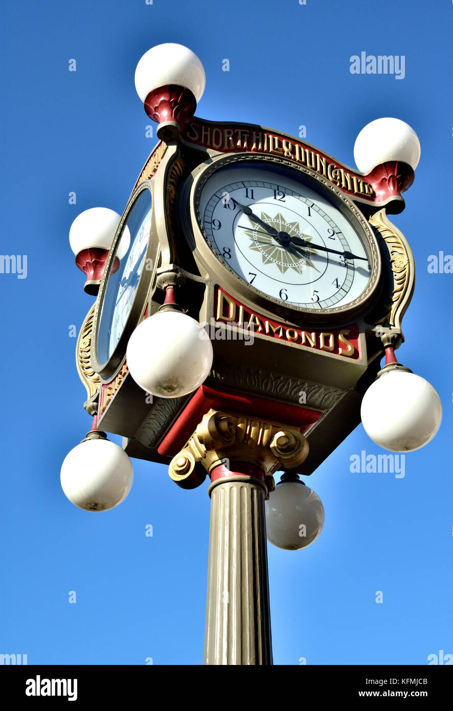 Antique four-face clock over a public meeting place in Victoria, BC Stock Photo