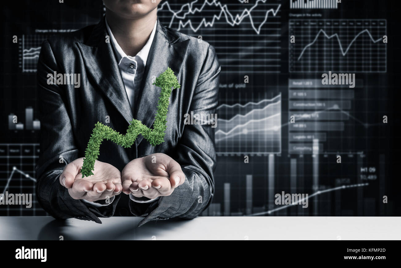 Businessman presenting growing graph Stock Photo - Alamy