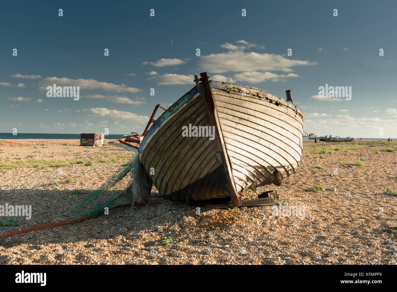 Derelict fishing boat abandoned on Dungeness beach Stock Photo - Alamy