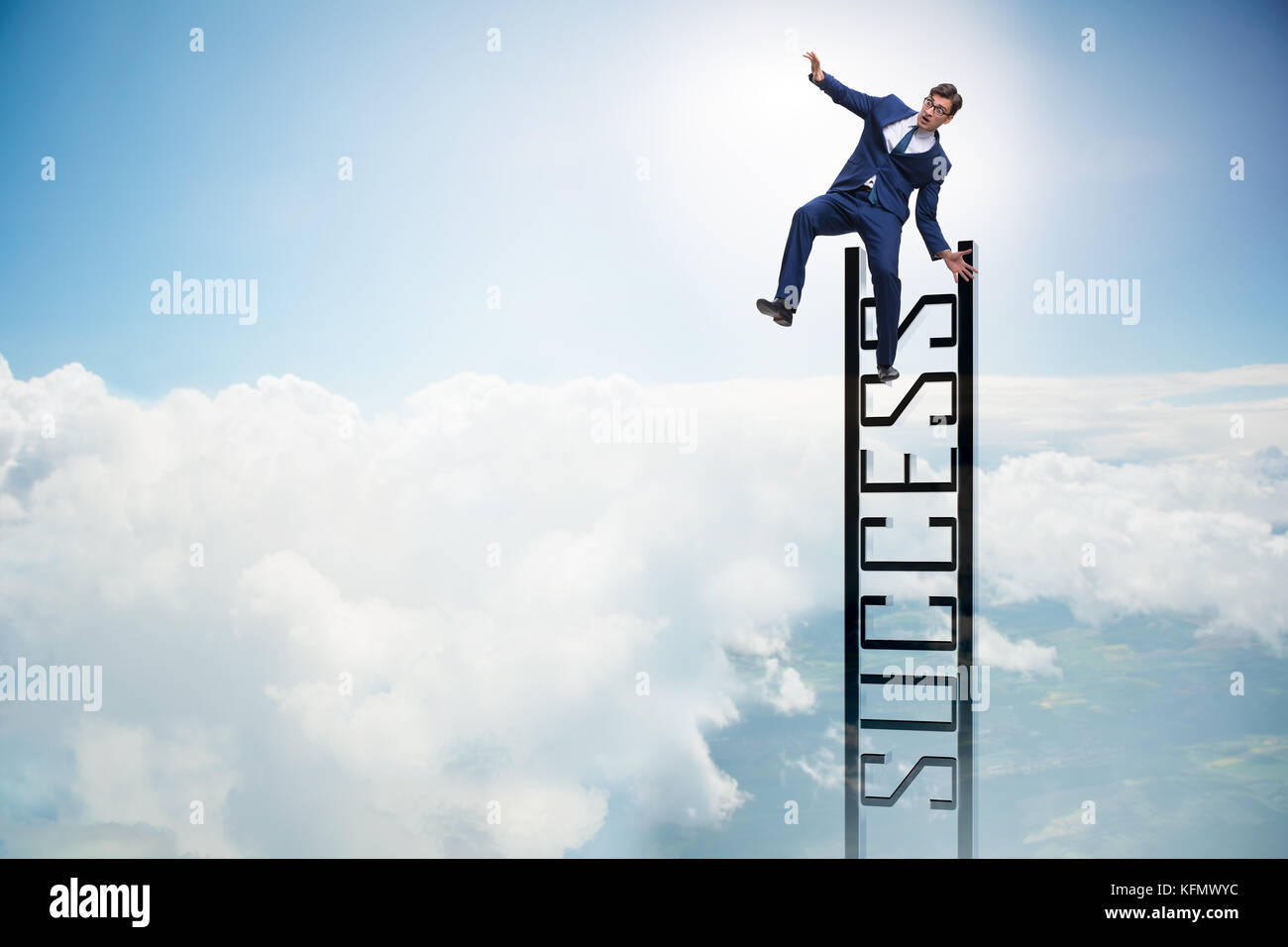Businessman slipping from the top of ladder Stock Photo Alamy