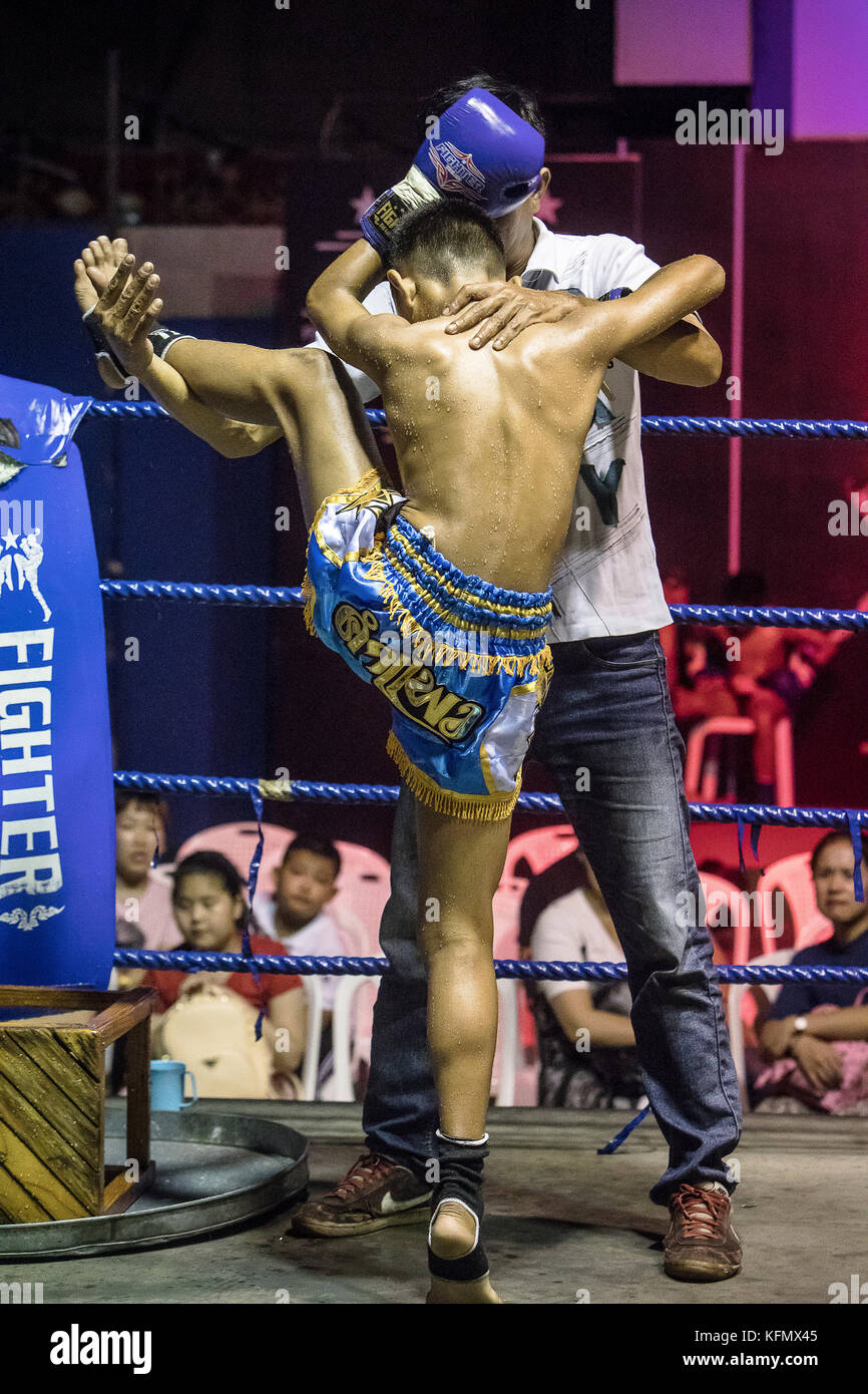 Boy, Muay Thai boxer stretching muscles, Bangkok, Thailand Stock Photo Alamy