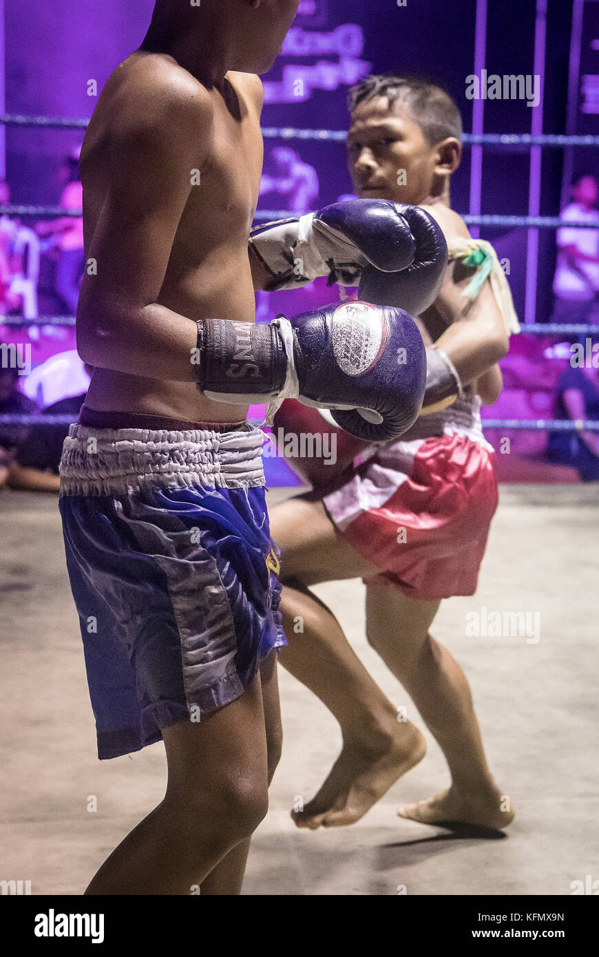 Boys, Muay Thai boxers fighting, Bangkok, Thailand Stock Photo Alamy