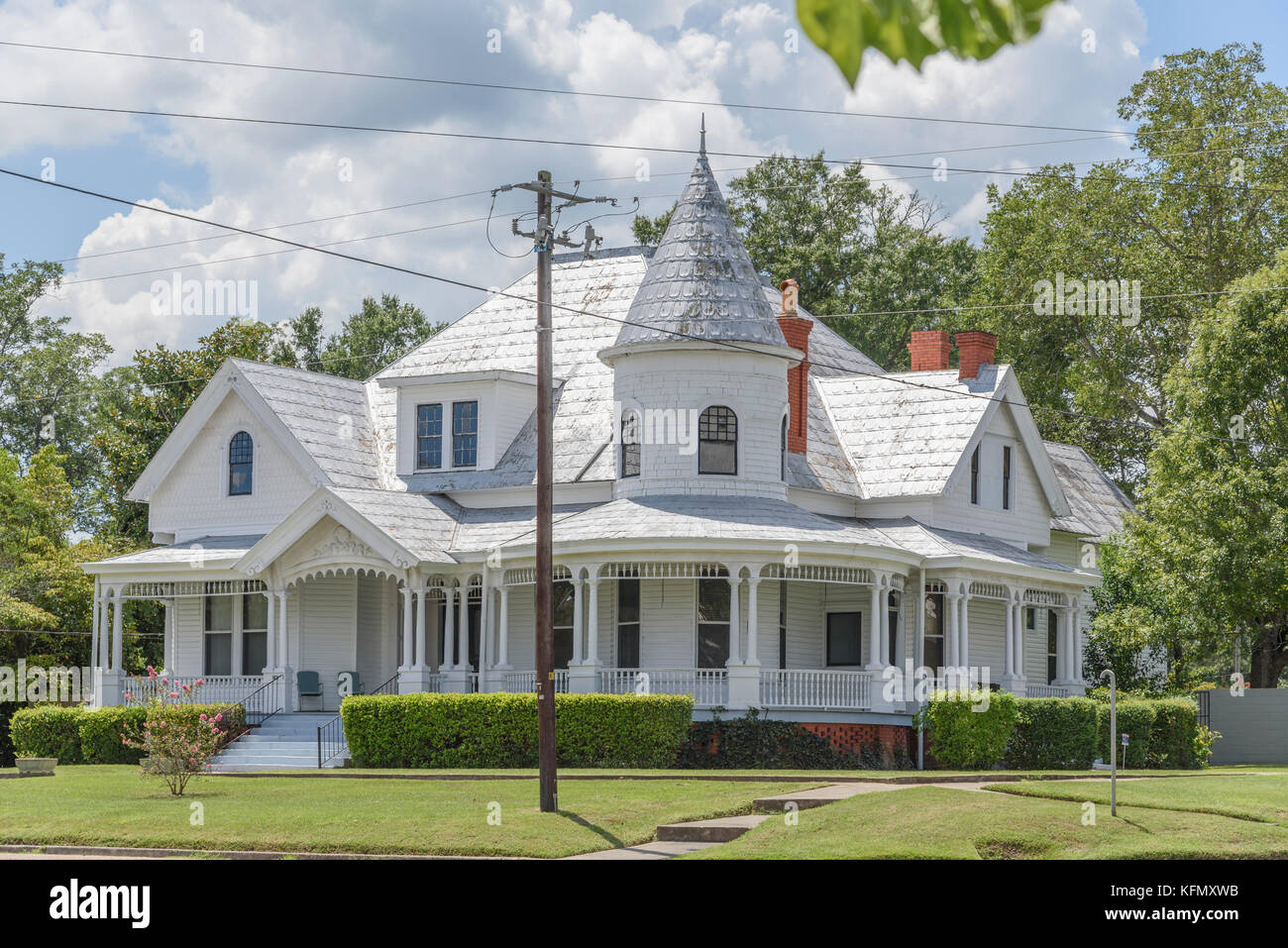 Restored old victorian house with a full wrap around front porch in Union Springs, Alabama USA. Stock Photo