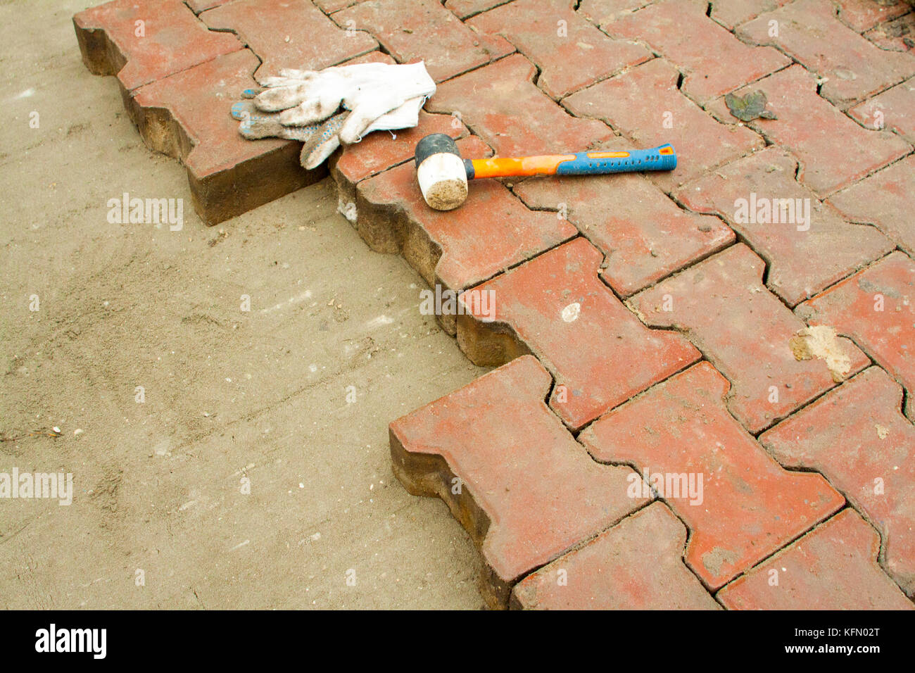 Laying Paving Slabs by mosaic closeup Stock Photo Alamy