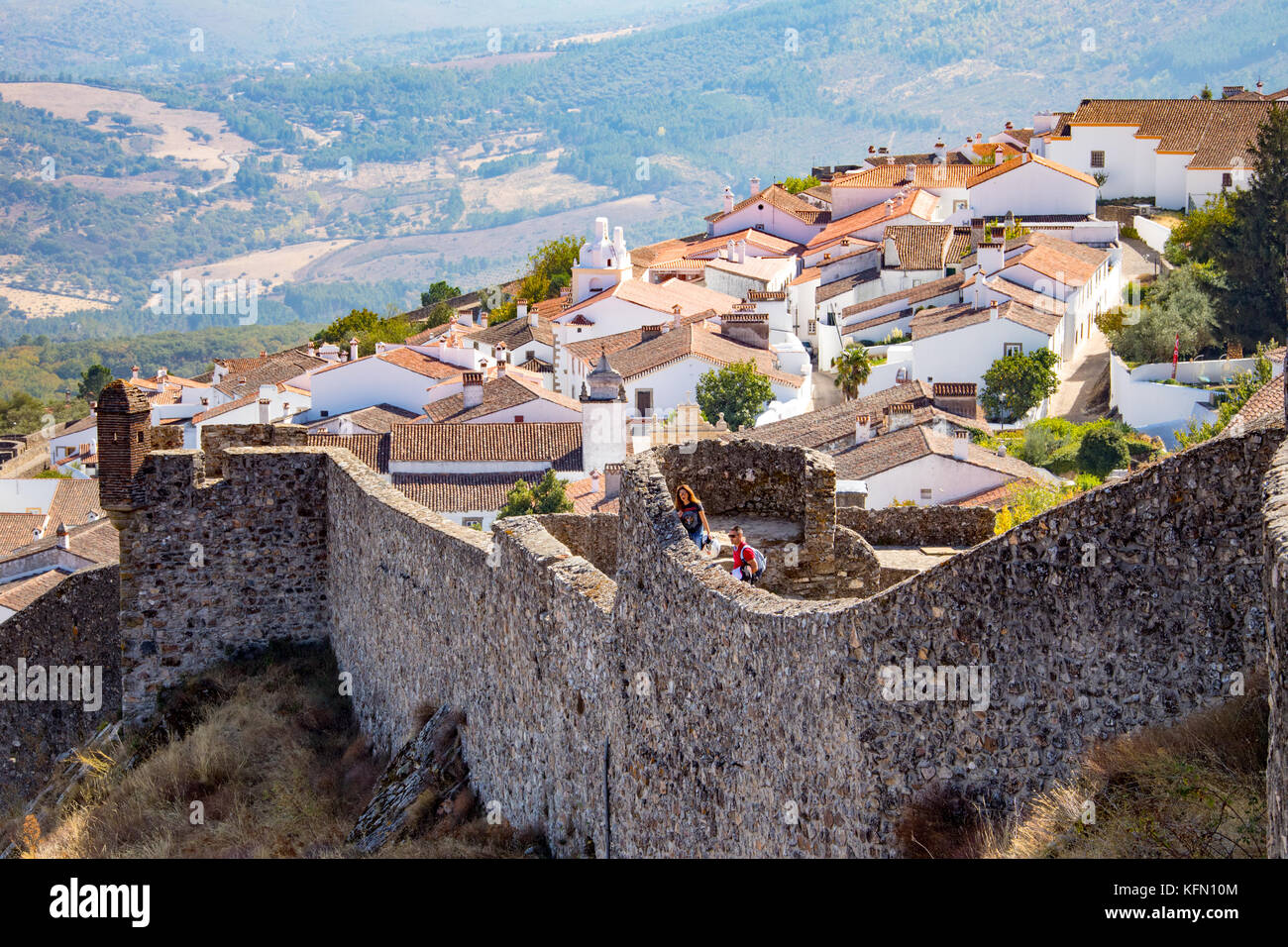 Tourists on the walls of Marvao Castle, Marvao, Alentejo, Portugal Stock Photo