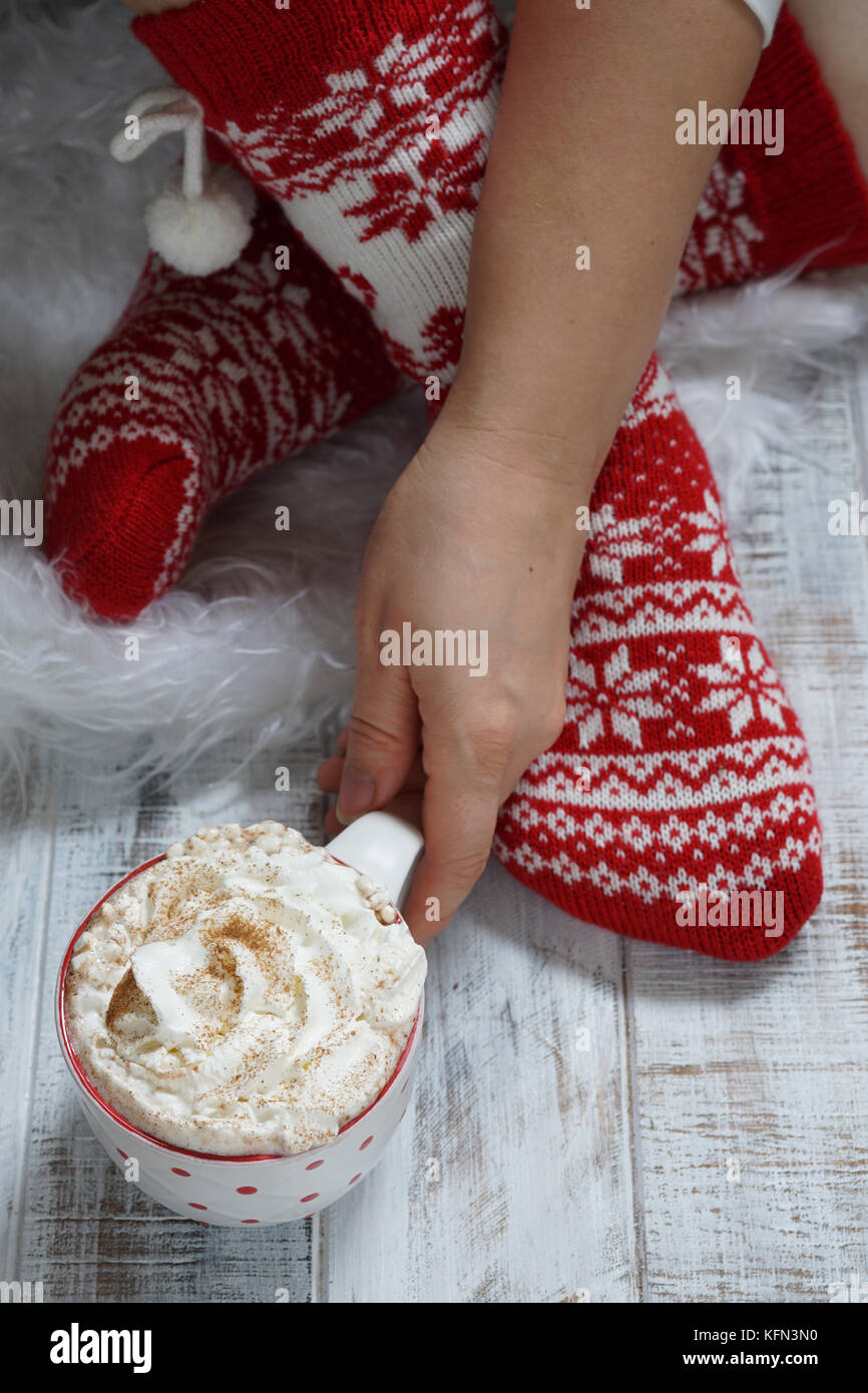 Woman in Christmas socks. Winter holiday Xmas and New Year concept Stock Photo