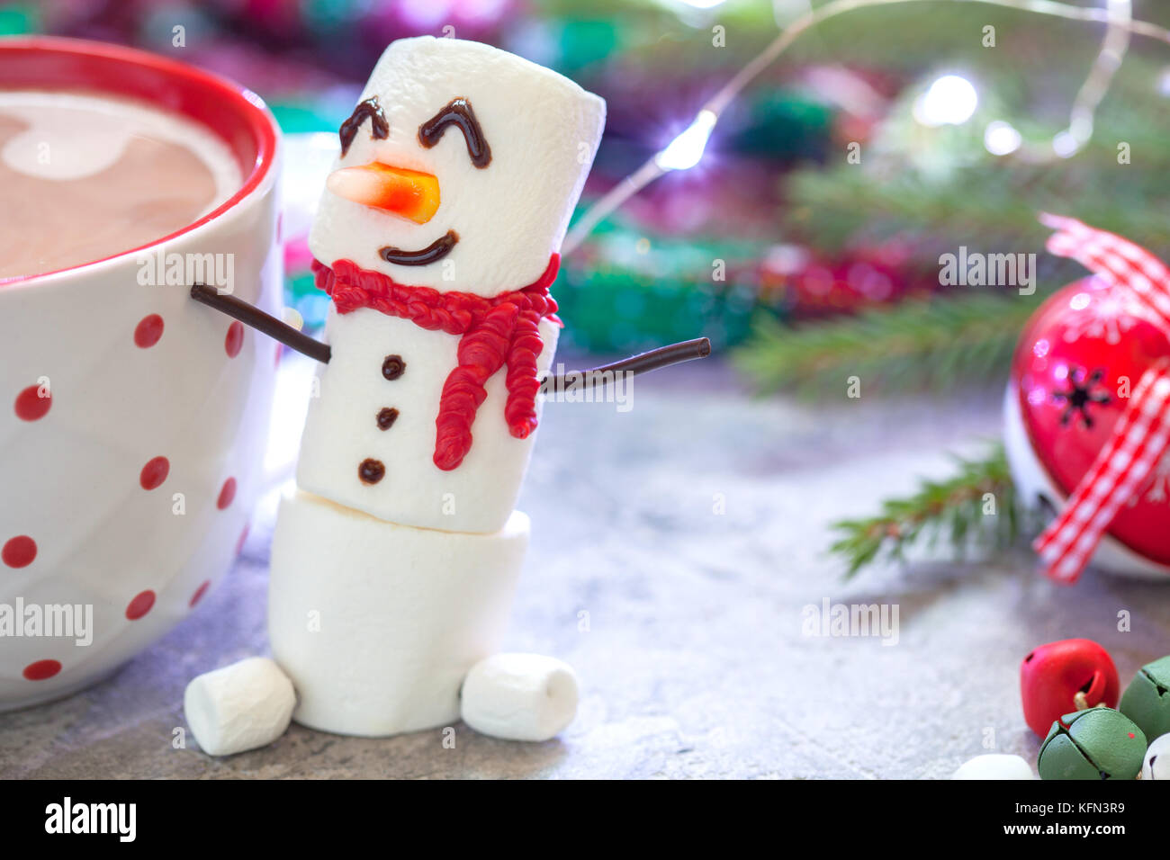 Hot chocolate with melted snowman Stock Photo