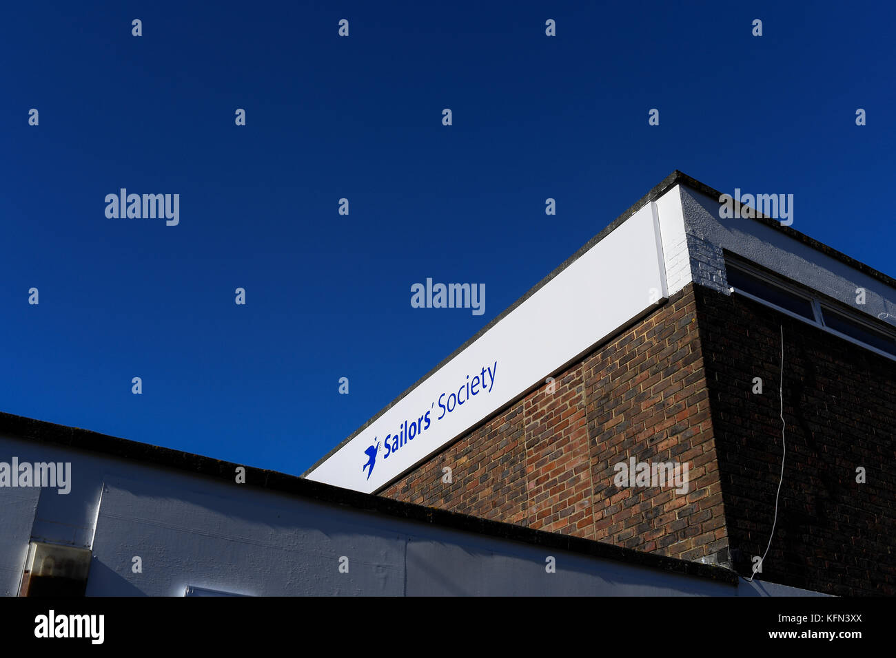 Sailors Society sign on building against a blue sky Stock Photo