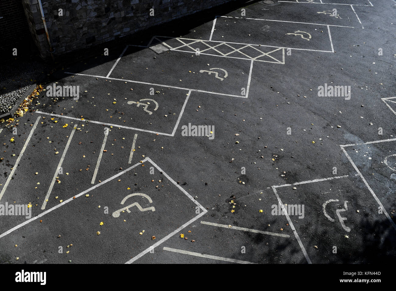 Empty disabled parking spaces with wheelchair markings on photographed from above. Stock Photo
