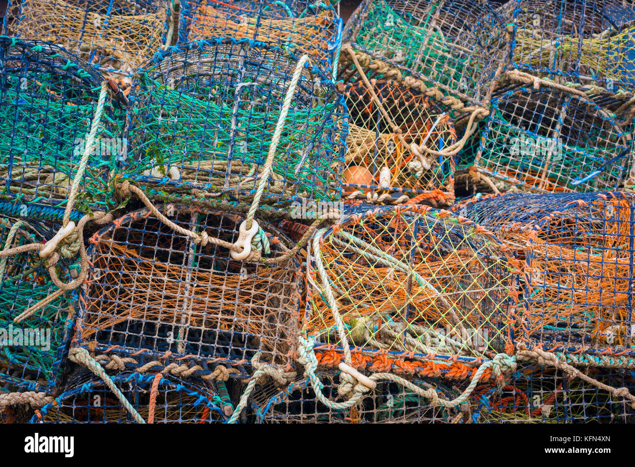 Fishing pots stacked outside a fisherman's hut in Felixstowe, Suffolk, UK. Stock Photo