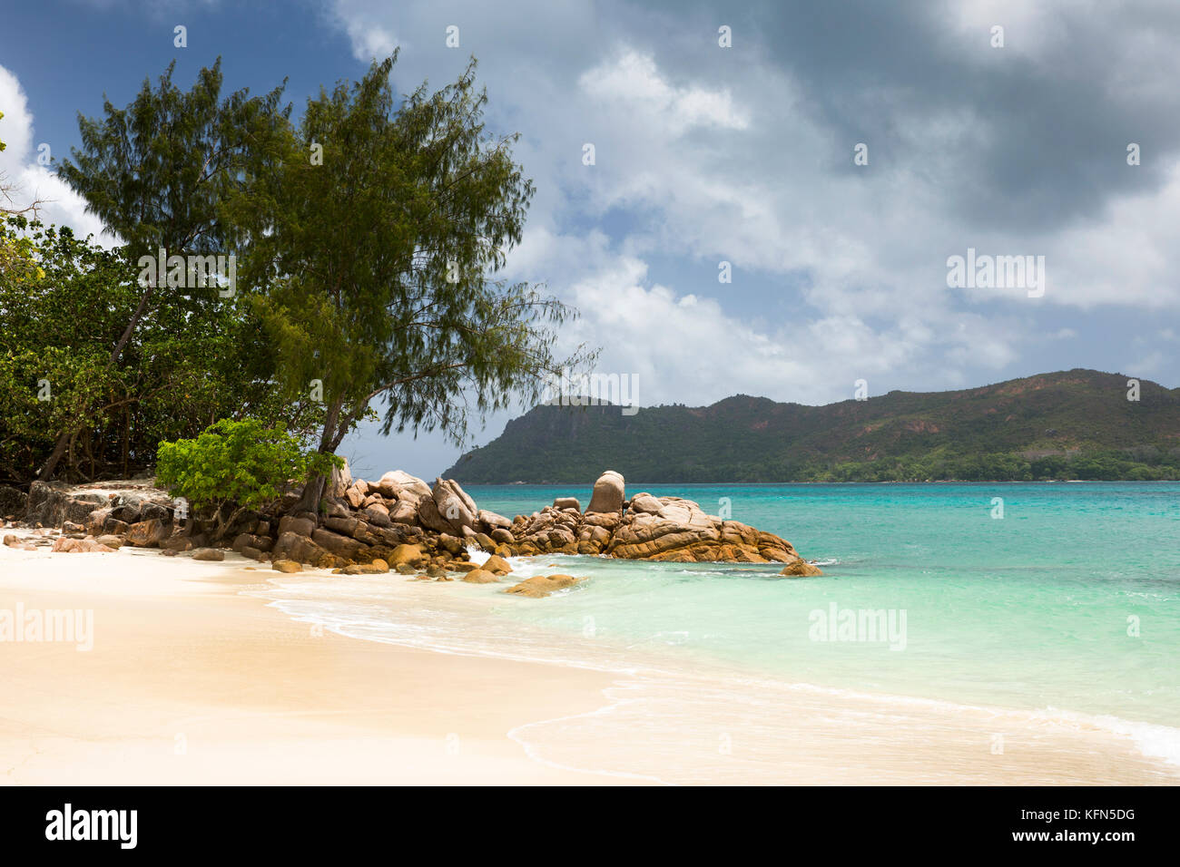 The Seychelles, Praslin, Anse Takamaka, Raffles Praslin Hotel and Resort, empty white sand beach Stock Photo