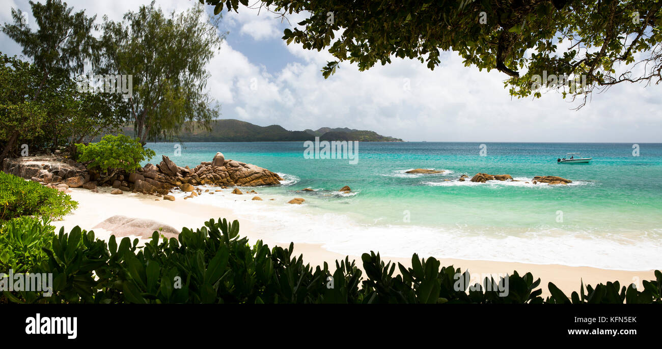 The Seychelles, Praslin, Anse Takamaka, Raffles Praslin Hotel and Resort, empty beach panoramic Stock Photo