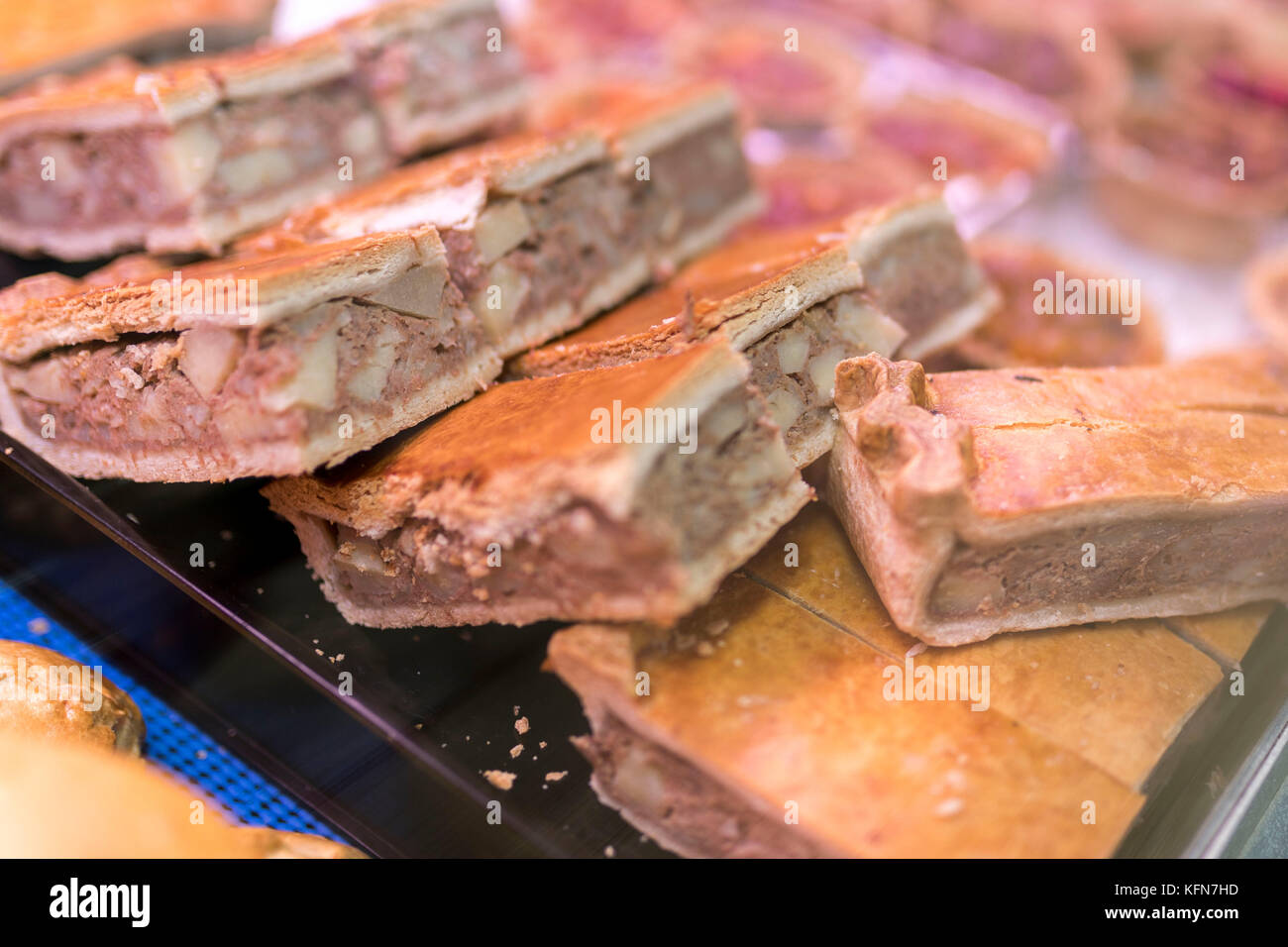Corned beef and potato tray bake pasties with shortcrust pastry on a