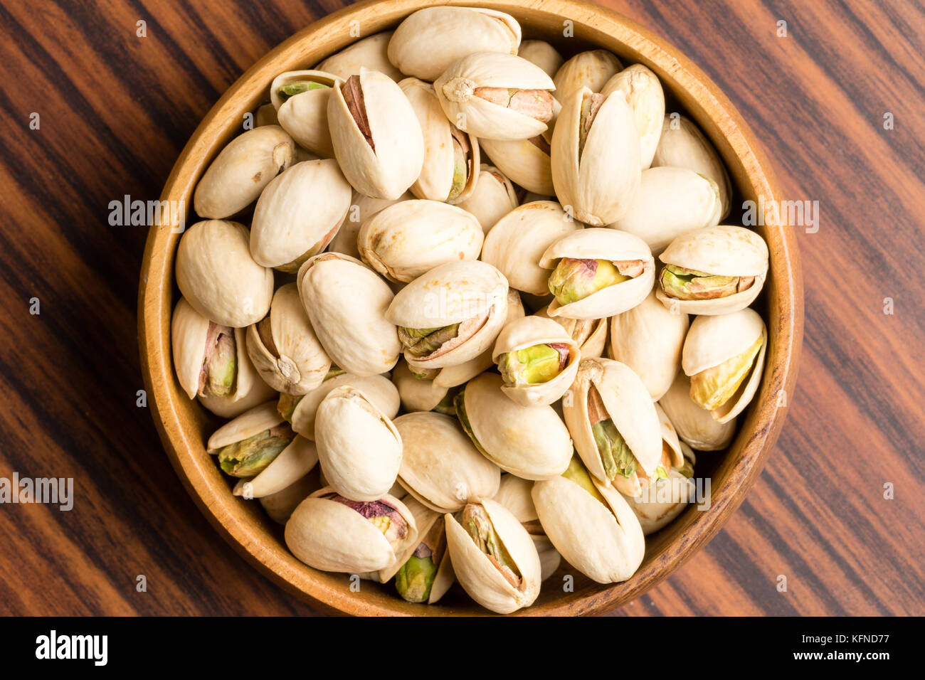 Healthy and delicious roasted salted pistachios nuts in shell Stock