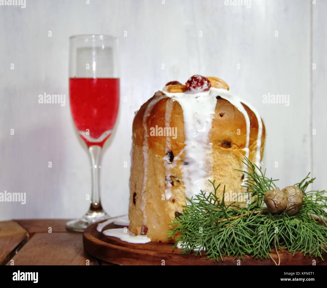 sweet bread Christmas pudding cin dried and glazed fruits and sparkling beverages Stock Photo