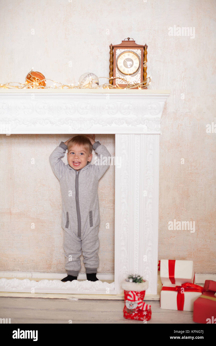 little boy Christmas and new year gifts Stock Photo - Alamy