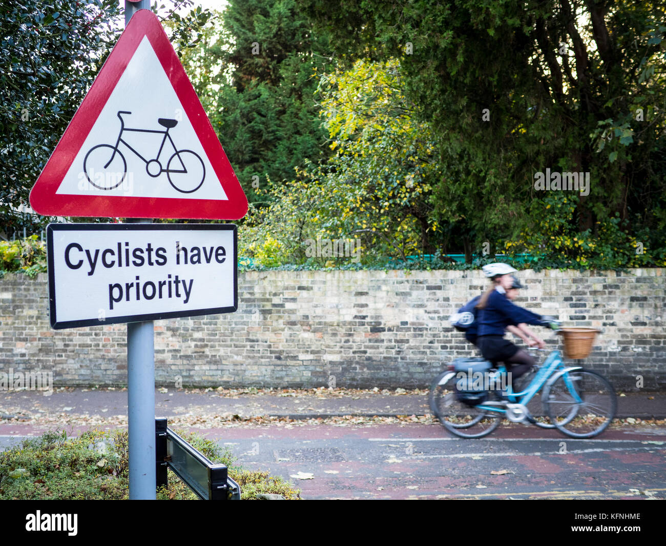 Safer Cycling - Cycling Safety  - Bike Safety - Cyclists have priority where a side road crosses a cycle path in Cambridge UK Stock Photo