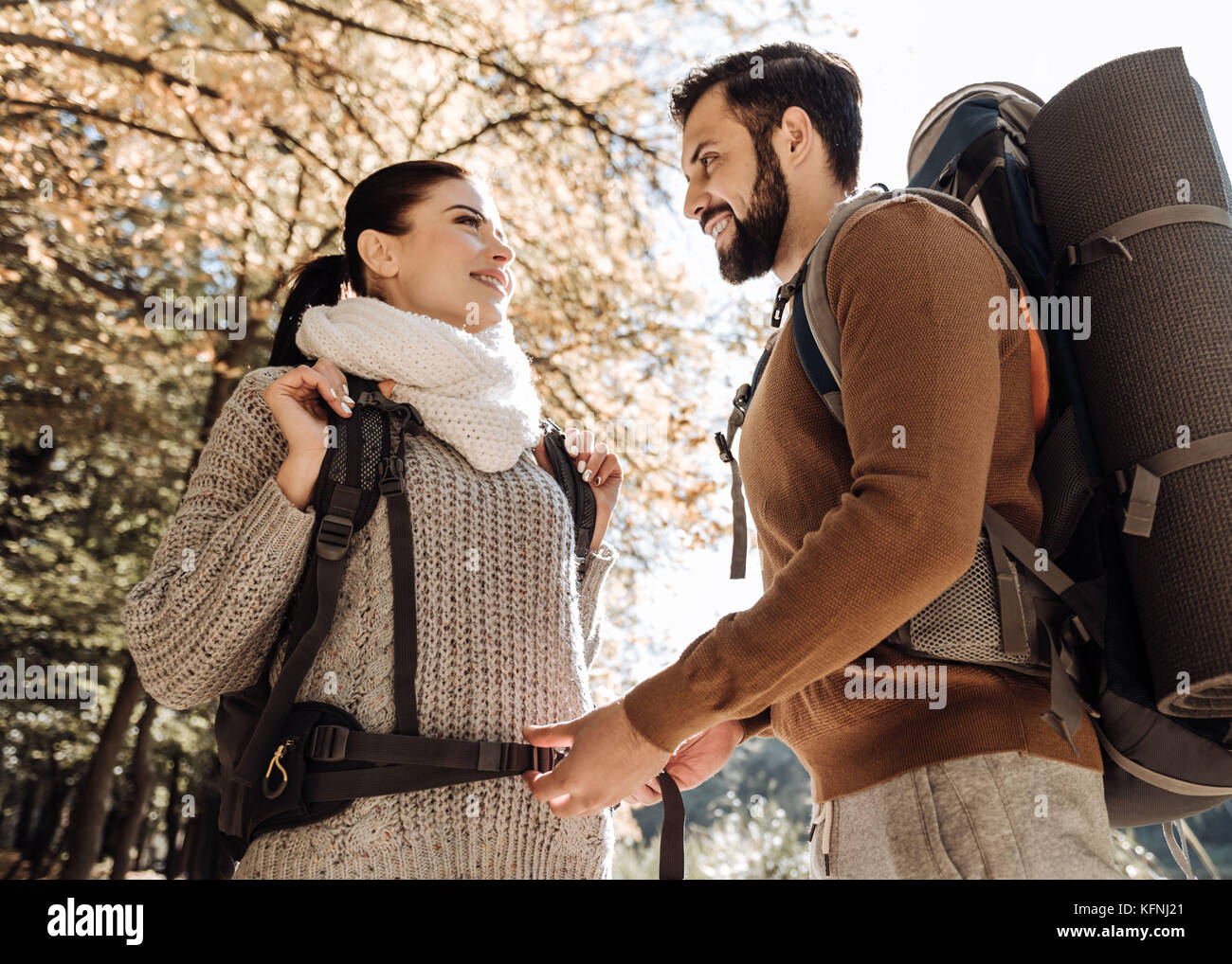 Young couple looking at each other Stock Photo - Alamy