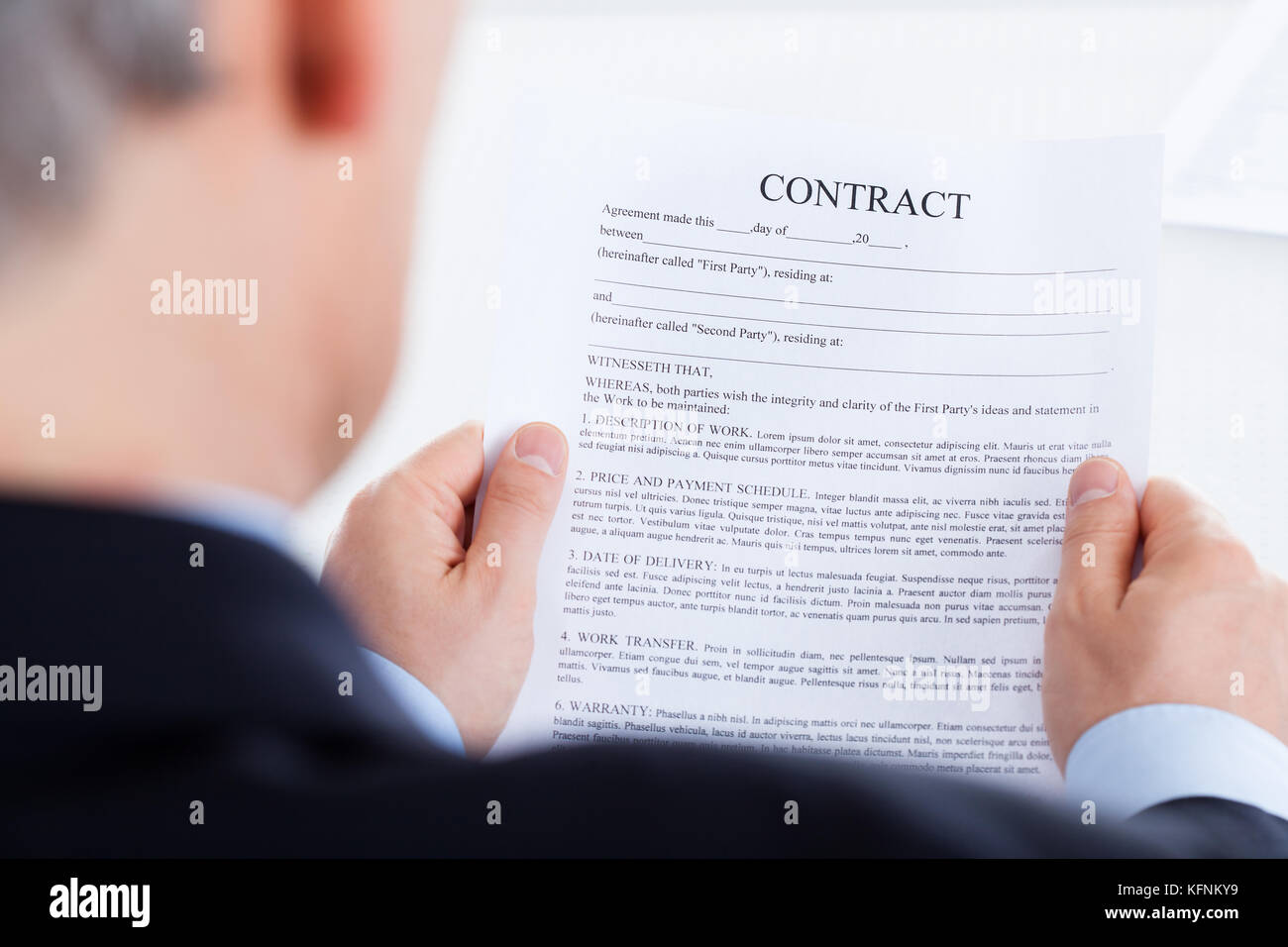 Close-up Photo Of Businessman Hand Contract Form Stock Photo
