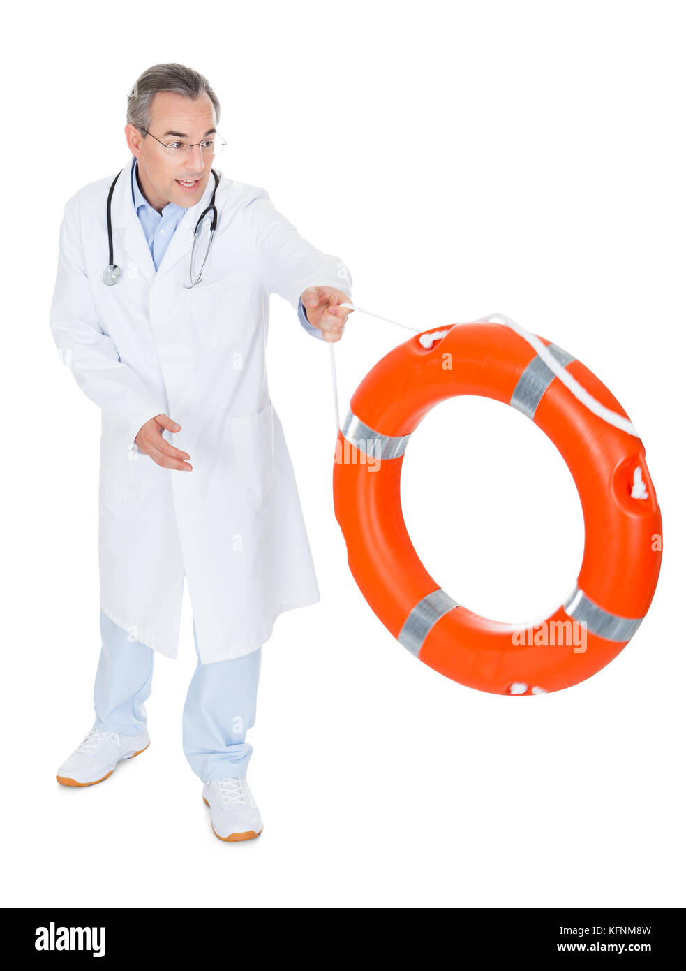 Male Doctor Holding Rescue Ring on white background Stock Photo