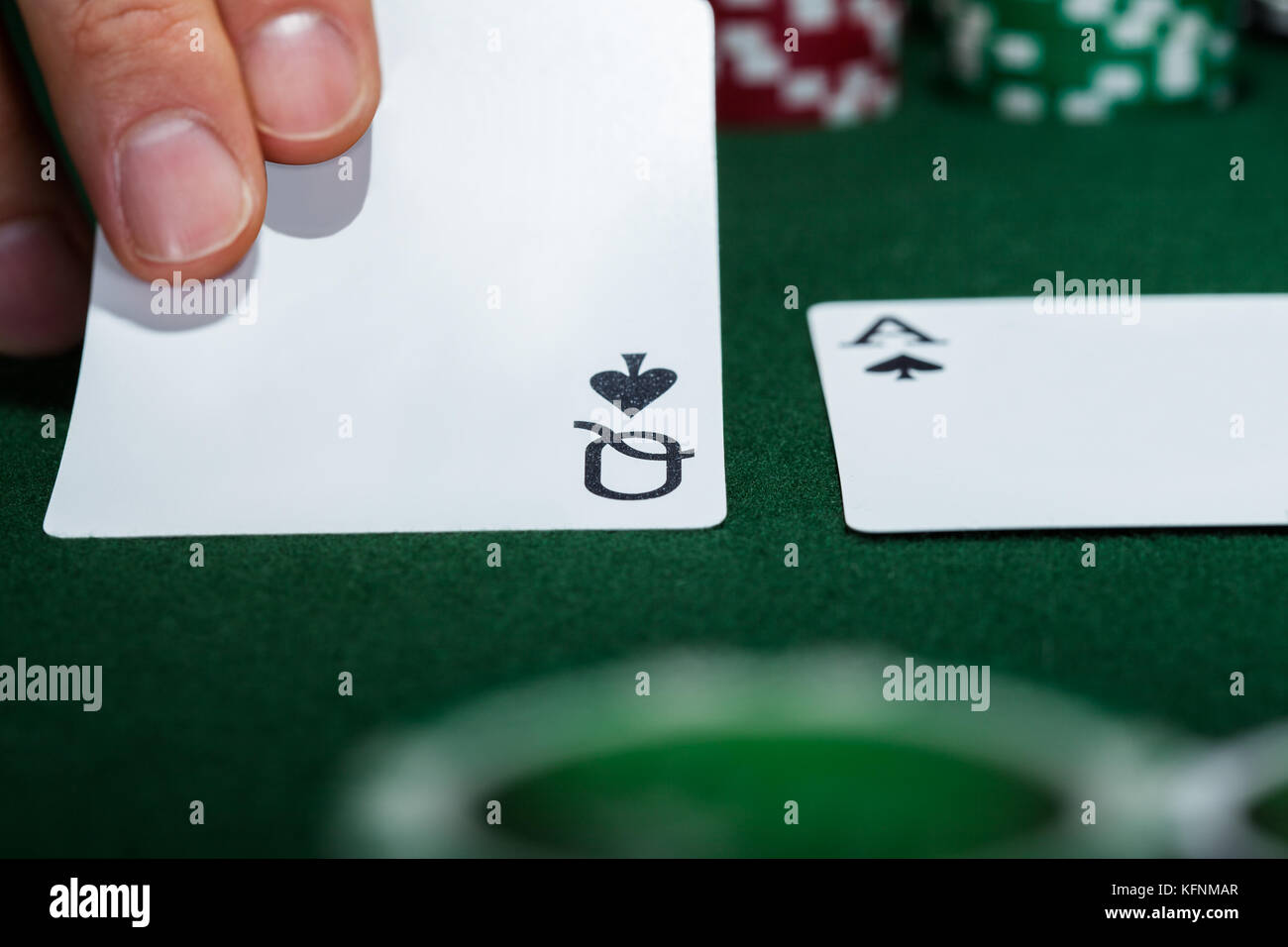 Close-up of croupier arranging cards on table Stock Photo