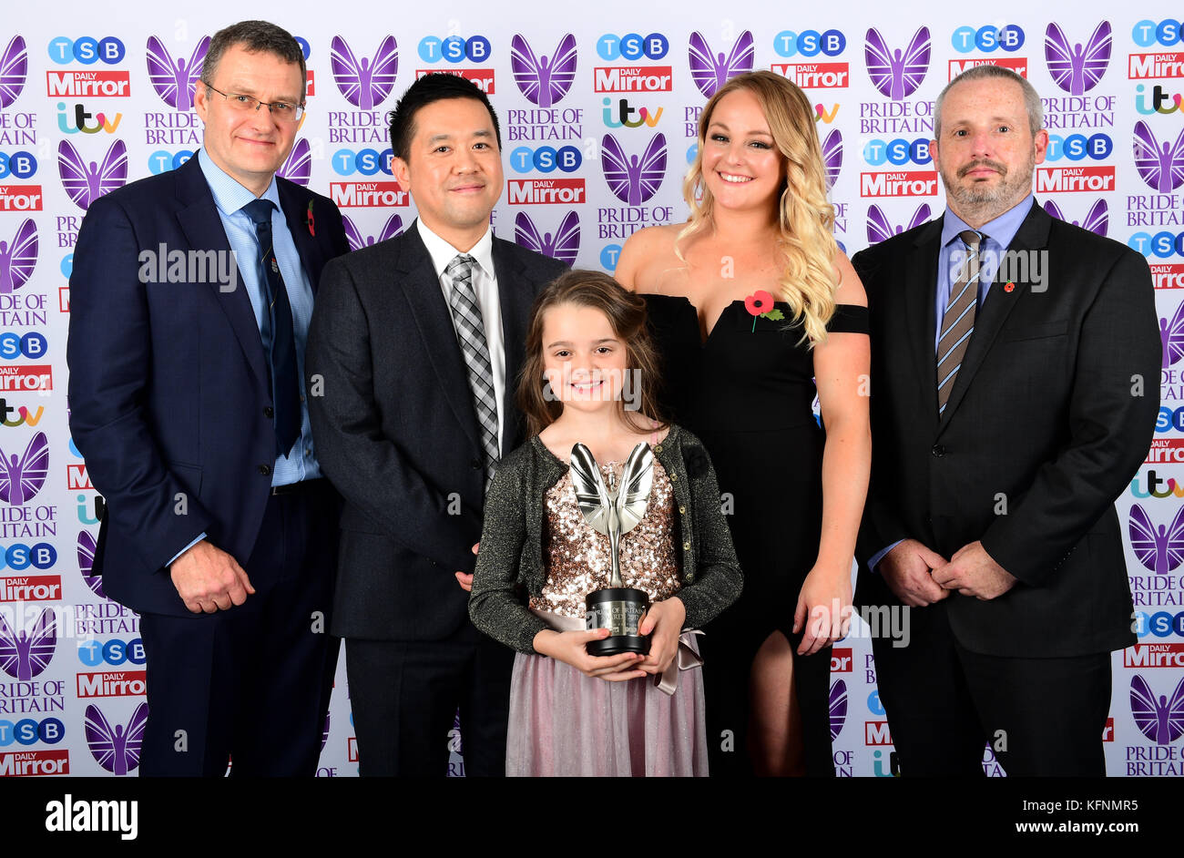 Manchester terror attack Dr's and victims Dr Russell Perkins, (L - R) Jason Wong, Lily Harrison, Lauren Thorpe and Dr Tony Gleeson receive a special recognition award during The Pride of Britain Awards 2017, at Grosvenor House, Park Street, London. Picture Date: Monday 30 October. Photo credit should read: Ian West/PA Wire Stock Photo