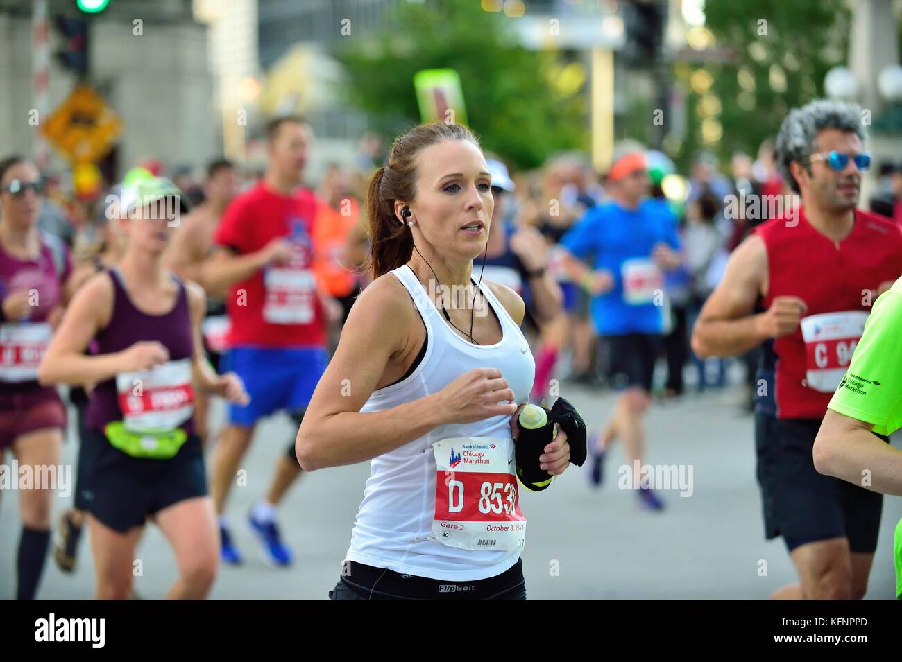 Tiffany Engleman, of Omaha, Nebraska, a face among the throng, running among the competitors during the 2017 Chicago Marathon. Stock Photo