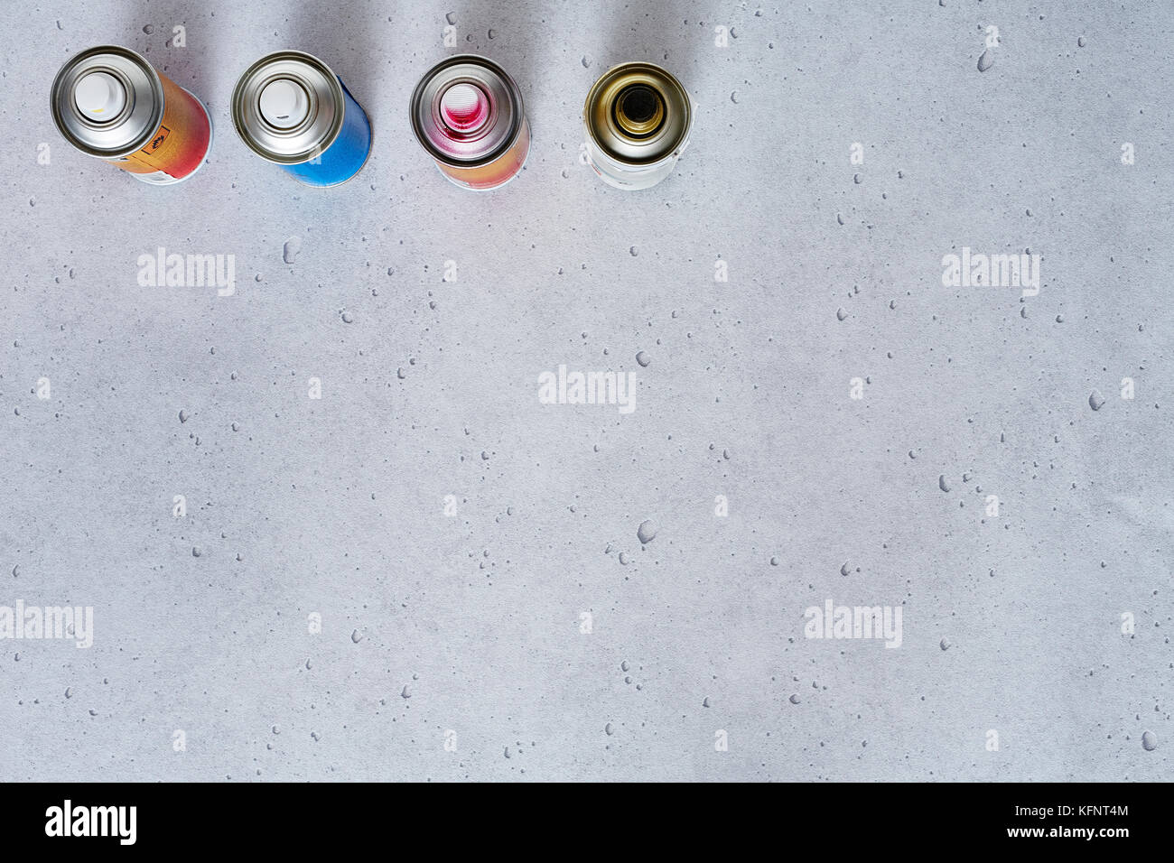 spray cans graphically on concrete Stock Photo