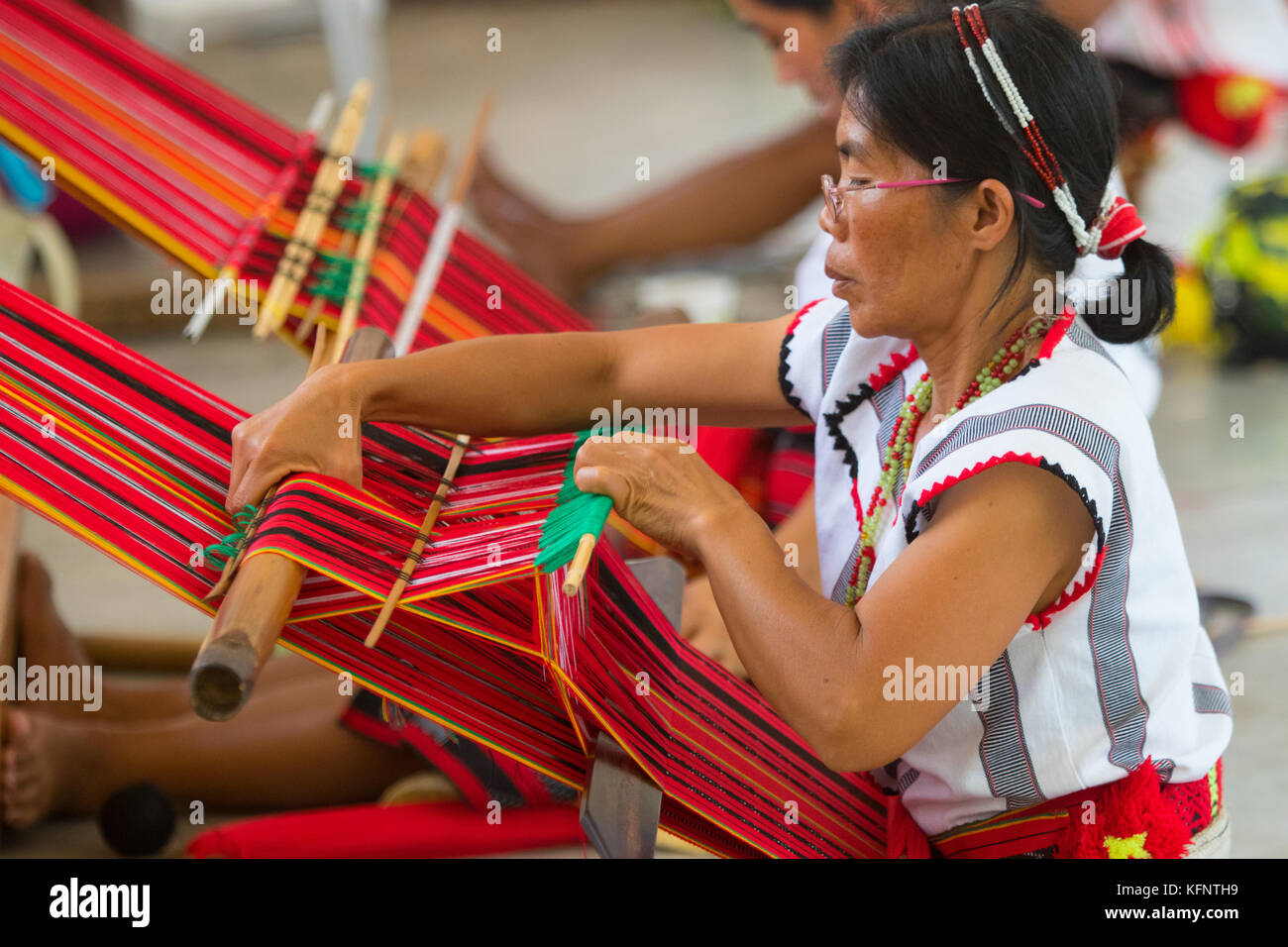 Ifugao women weaving during the annual Imbayah Festival which celebrates the age old traditions