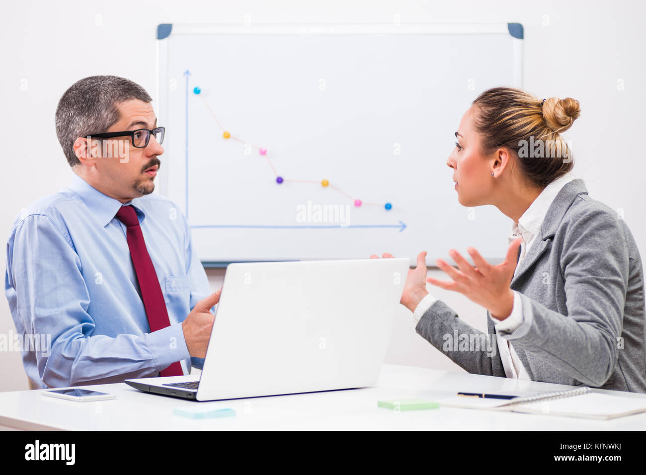 Business people are arguing in their office. Stock Photo
