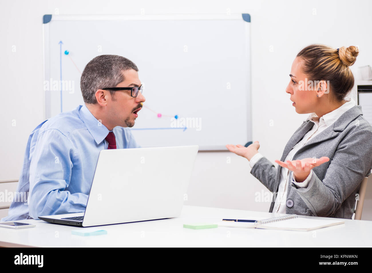 Business people are arguing in their office. Stock Photo