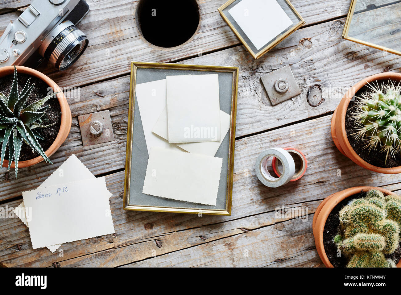 old frames vintage photographies on industrial desk Stock Photo Alamy