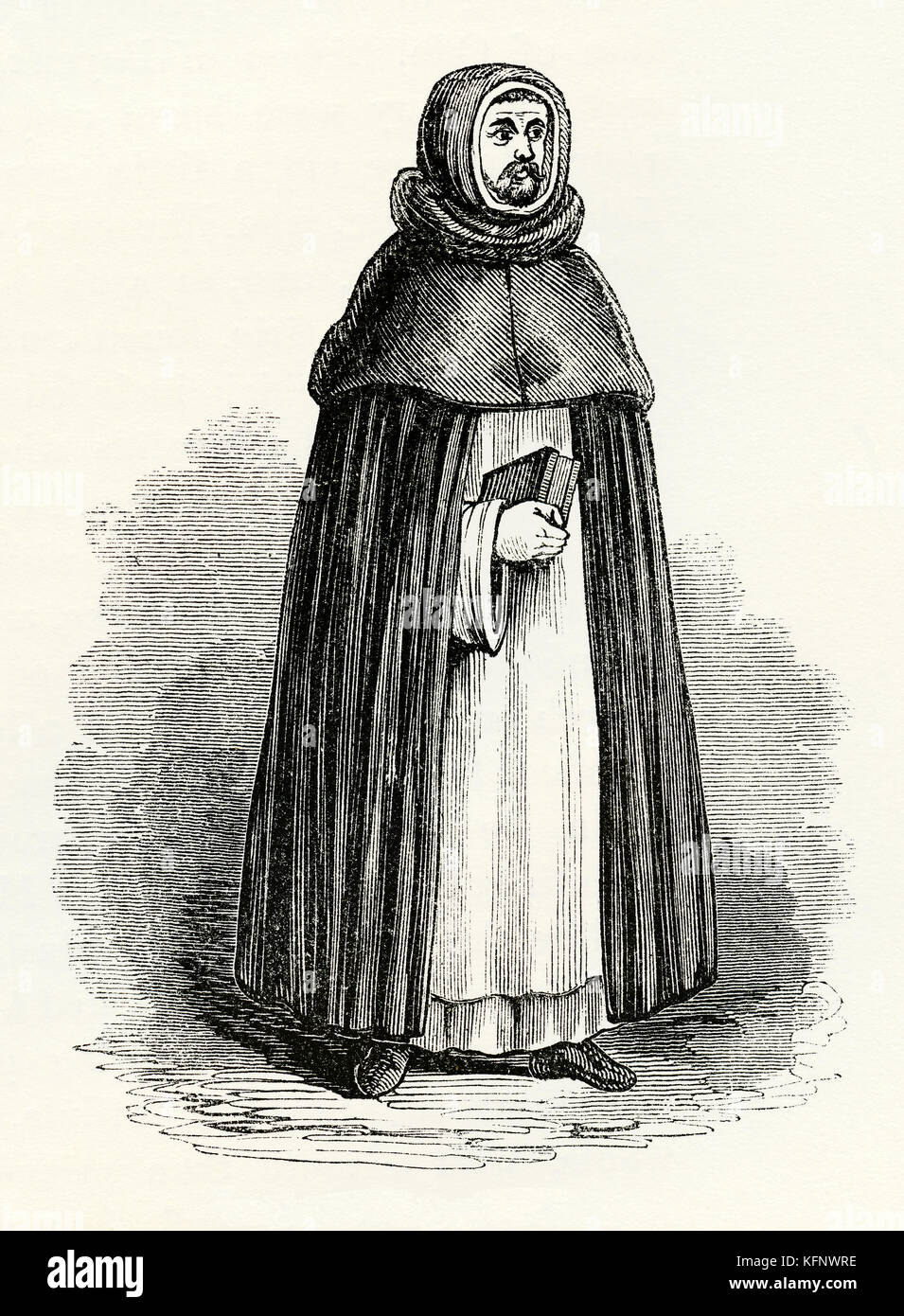 An old engraving depicting a Blackfriars monk in Medieval times. In England and other countries the Dominican friars are referred to as 'Black Friars' because of the black cappa or cloak they wore over their white habits. Stock Photo