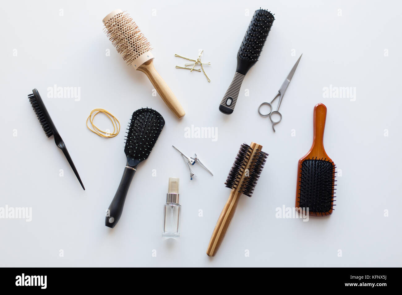 scissors, hair brushes, clips and styling spray Stock Photo Alamy