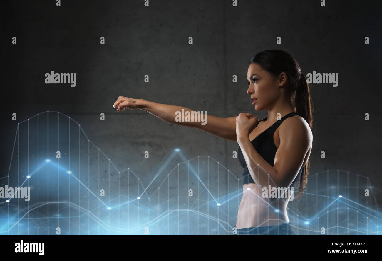 woman boxing in gym Stock Photo