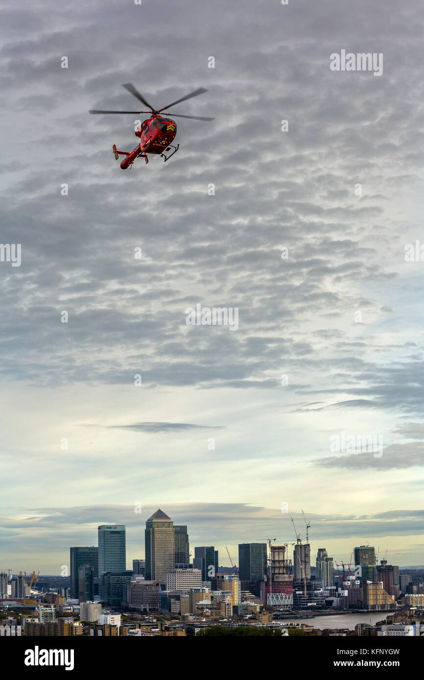 London Air Ambulance helicopter returning to helipad on the Royal London Hospital. Stock Photo