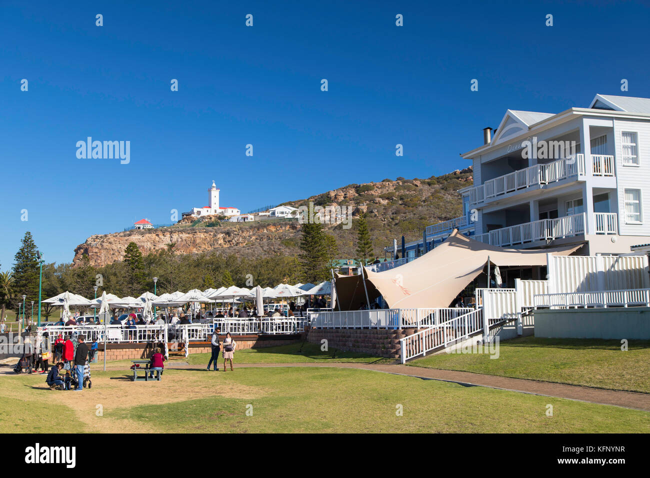 Restaurants and Cape St Blaize lighthouse at The Point, Mossel Bay, Western Cape, South Africa Stock Photo