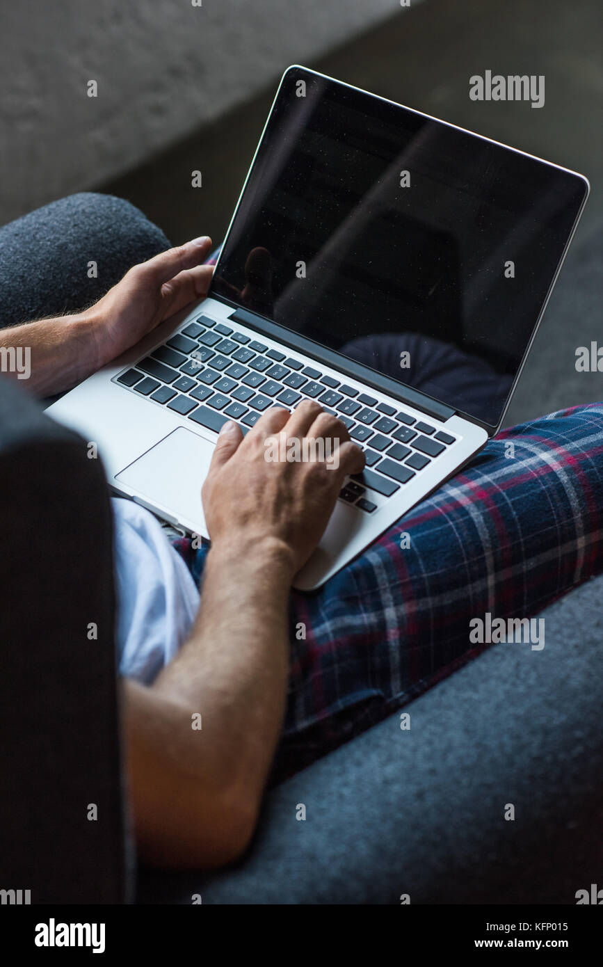 man using laptop Stock Photo - Alamy