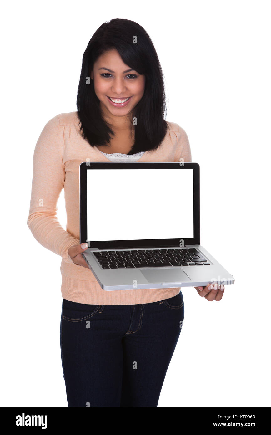 Young Woman Holding Laptop Over White Background Stock Photo - Alamy