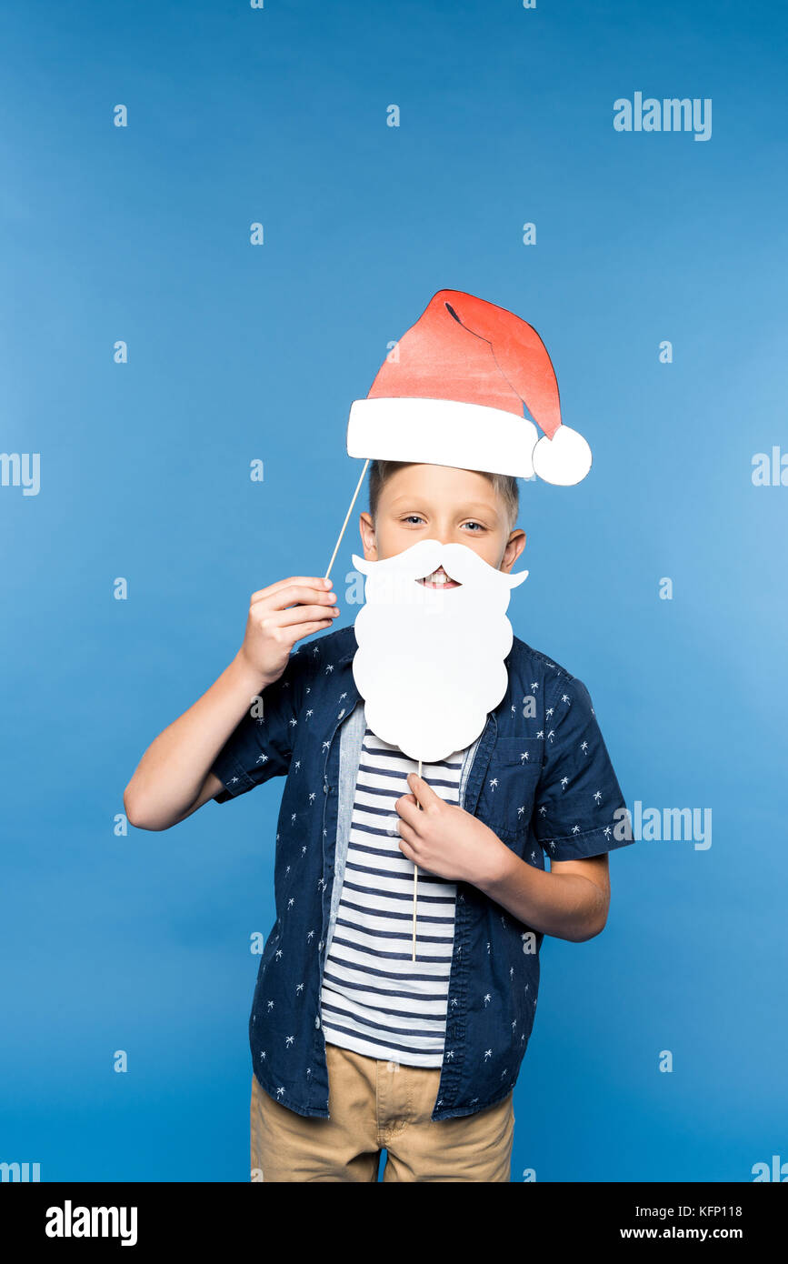 boy with santa hat and fake beard Stock Photo
