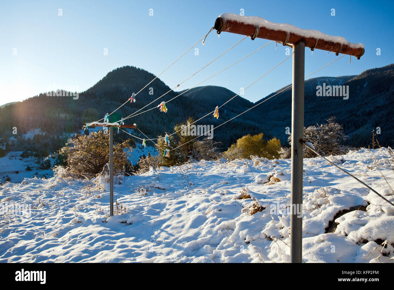 First snow. Frozen clothesline. Stock Photo