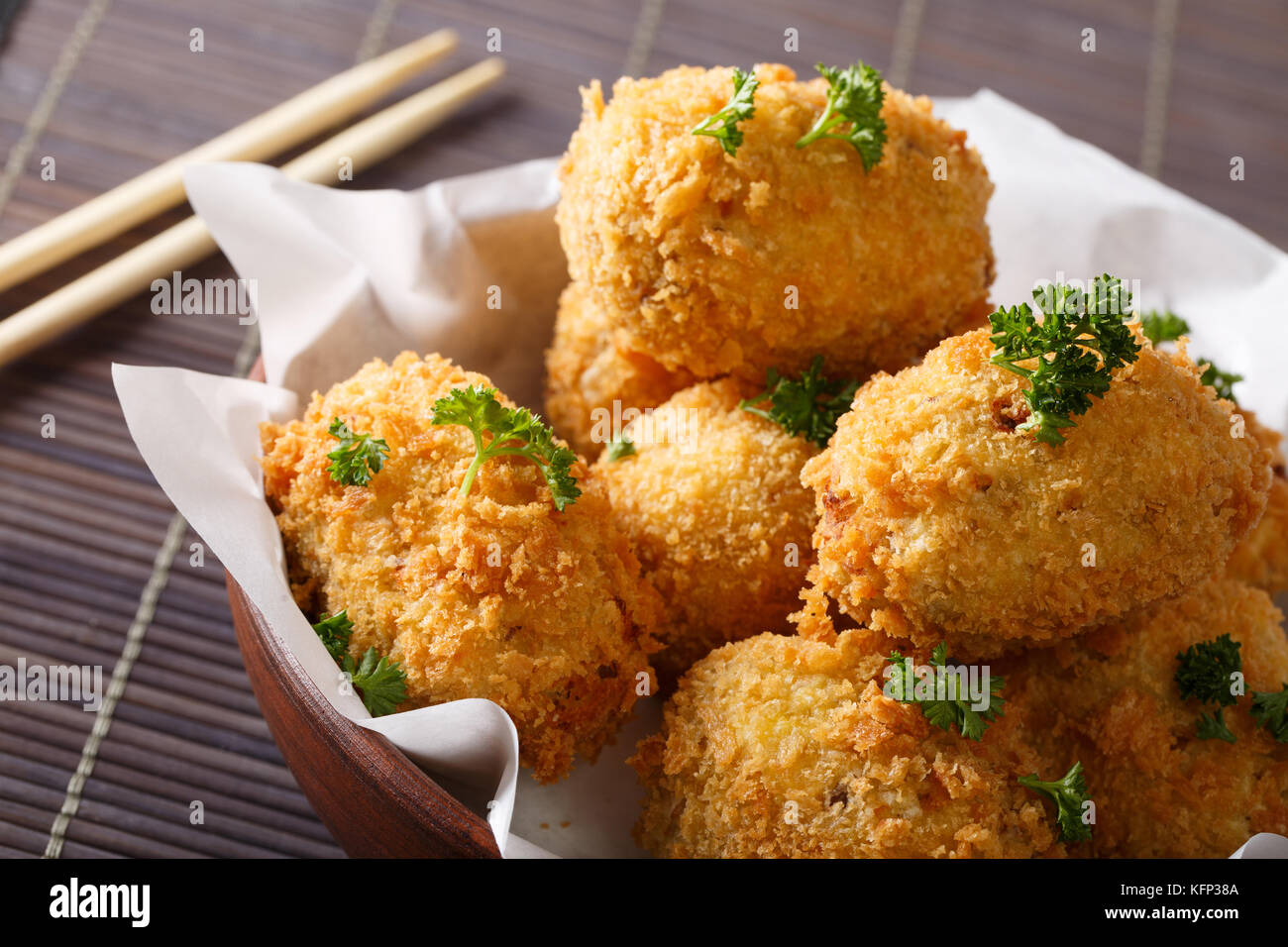 Japanese appetizer potato korokke close up in a bowl on the table