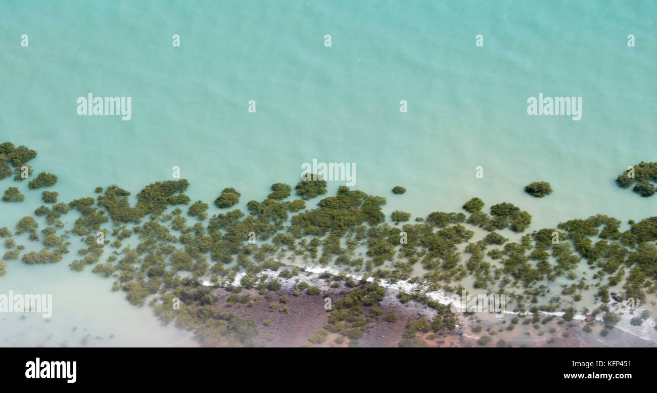 .Aerial view of Broome, North Western Australia as the plane descends for landing on a  hot afternoon in the Wet Season with the mangroves below. Stock Photo